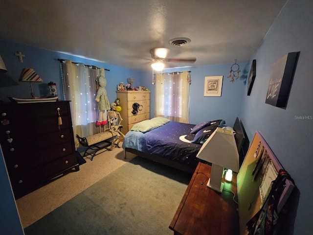 carpeted bedroom featuring ceiling fan