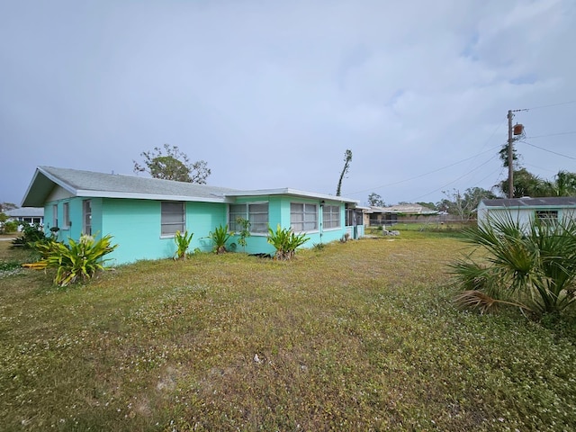 exterior space with a yard