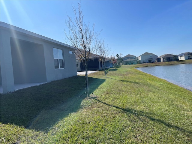 view of yard with a water view