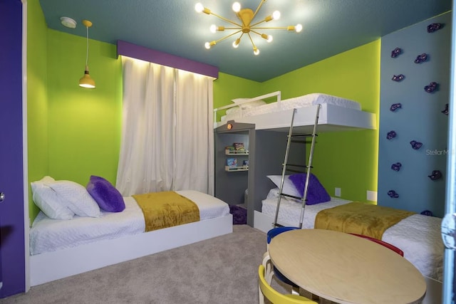 bedroom featuring carpet flooring, a chandelier, and a textured ceiling