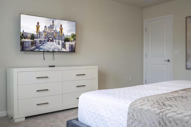 bedroom with light carpet