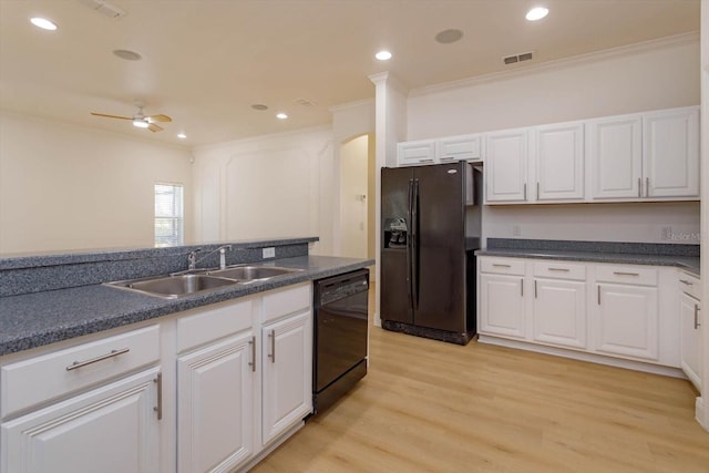 kitchen featuring white cabinetry, sink, ceiling fan, black appliances, and light wood-type flooring