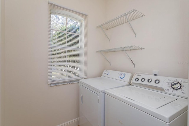 laundry area featuring independent washer and dryer