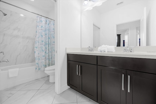 full bathroom with shower / bath combo with shower curtain, vanity, and toilet