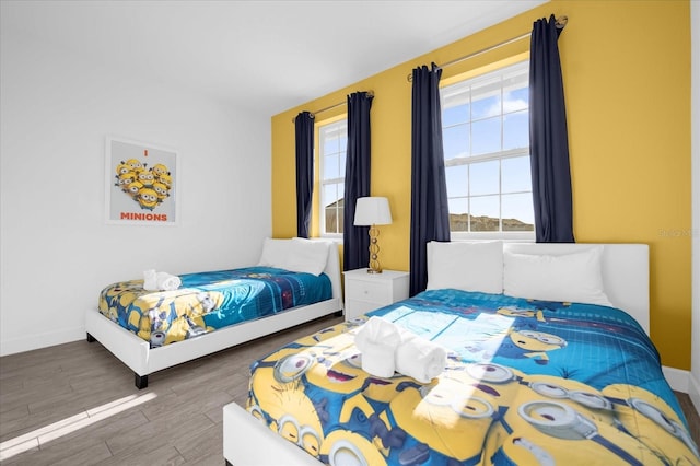 bedroom with wood-type flooring