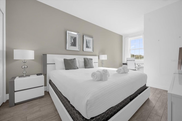 bedroom featuring wood-type flooring