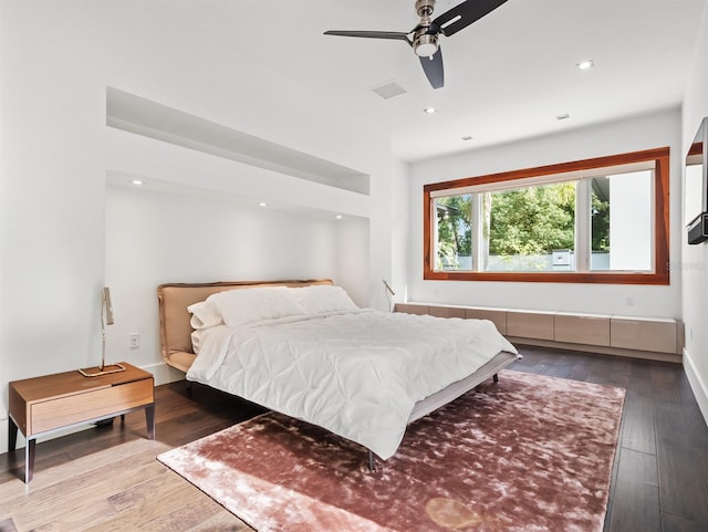 bedroom featuring hardwood / wood-style floors and ceiling fan