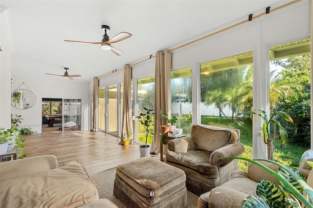 sunroom / solarium with ceiling fan