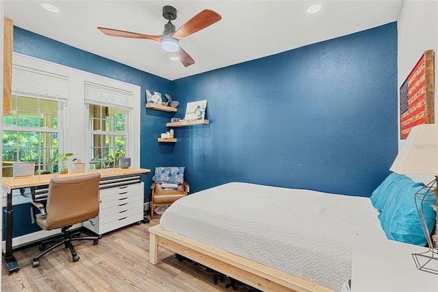 bedroom featuring ceiling fan and light wood-type flooring