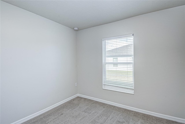 empty room with light carpet