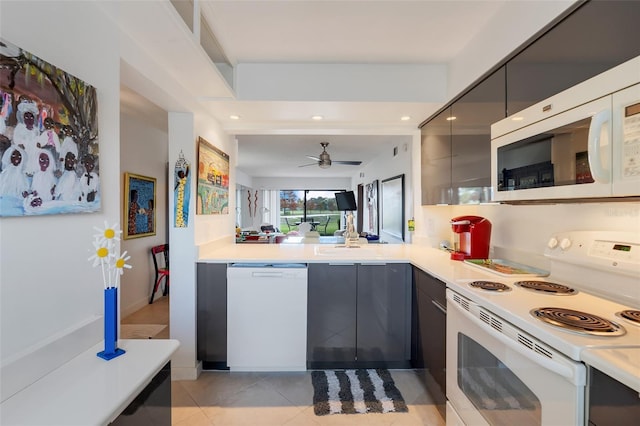 kitchen with white appliances, gray cabinets, ceiling fan, and light tile patterned flooring