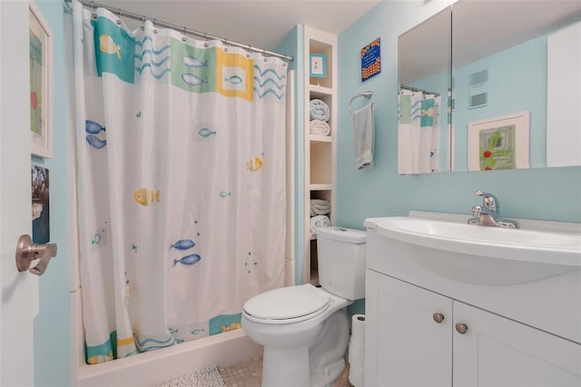 bathroom featuring a shower with shower curtain, vanity, toilet, and tile patterned flooring