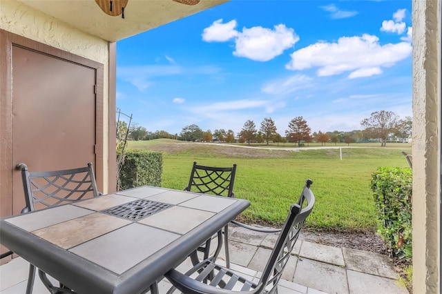 view of patio / terrace featuring a rural view