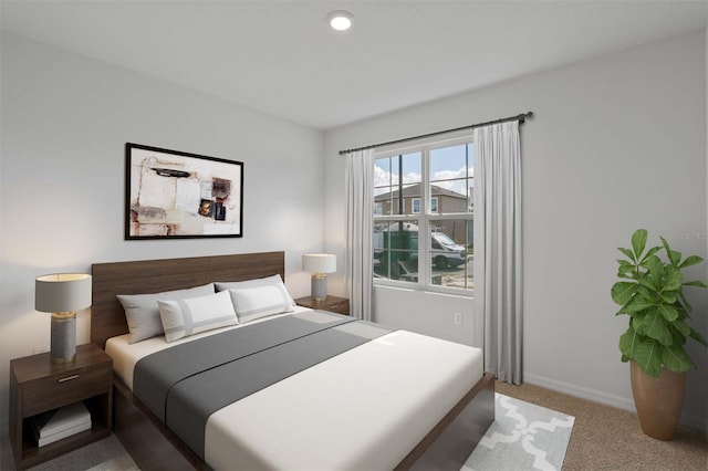 bedroom with light colored carpet