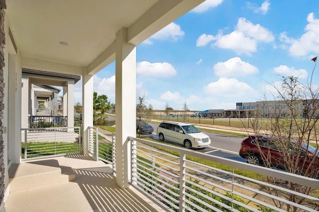 balcony featuring covered porch