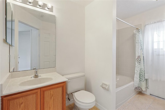 full bathroom with tile patterned flooring, vanity, toilet, and shower / bath combo with shower curtain