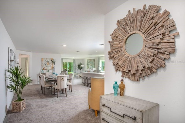 dining space with carpet