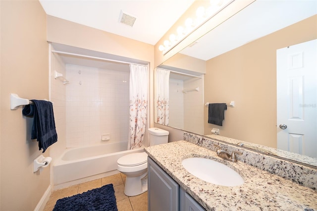 full bathroom featuring vanity, shower / tub combo with curtain, tile patterned floors, and toilet