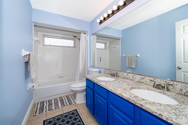 full bathroom with shower / bath combination with curtain, tile patterned floors, toilet, and vanity