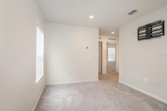 view of carpeted spare room