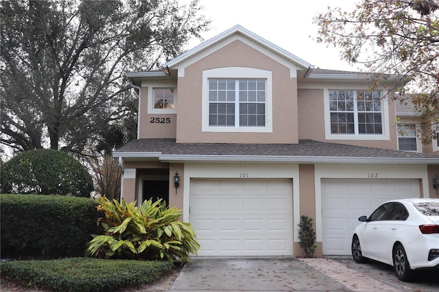 view of front of home with a garage