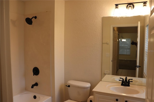 full bathroom with vanity, toilet, and shower / washtub combination