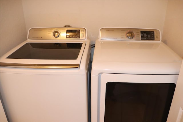 laundry area featuring washer and clothes dryer