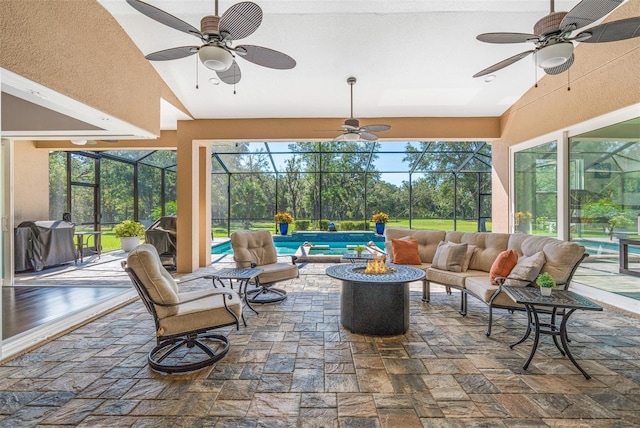 sunroom / solarium featuring vaulted ceiling, a healthy amount of sunlight, and a swimming pool