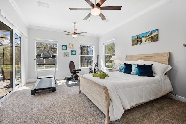 carpeted bedroom with ceiling fan, access to exterior, and crown molding