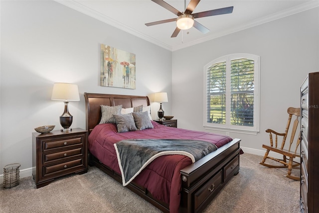 bedroom featuring ceiling fan, crown molding, and light colored carpet