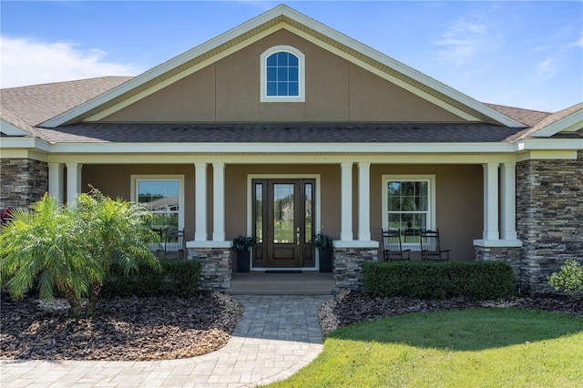 doorway to property featuring a porch