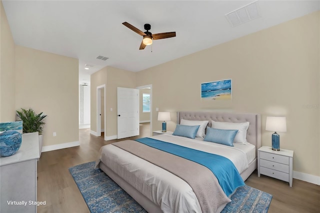 bedroom with hardwood / wood-style flooring and ceiling fan