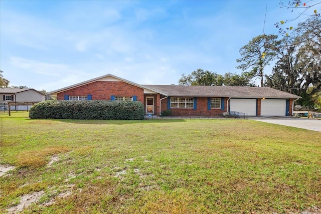 single story home with a garage and a front yard