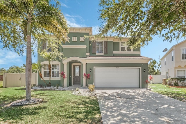 view of front of home featuring a garage and a front lawn