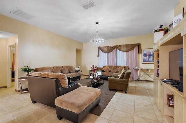 tiled living room featuring a chandelier