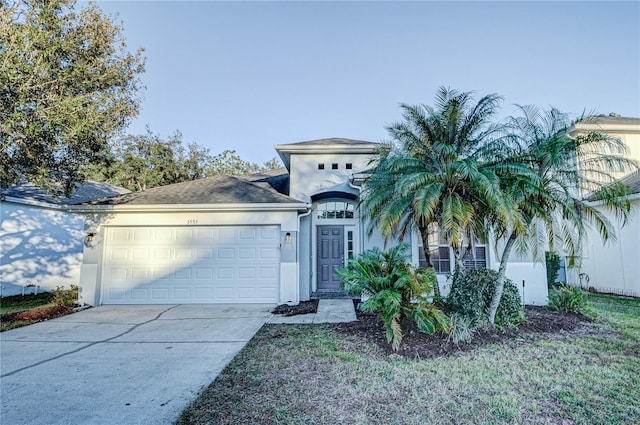 view of front of home with a garage