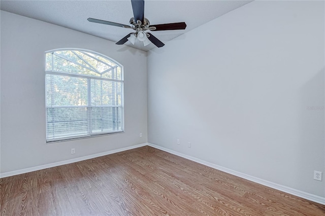 spare room with ceiling fan and light hardwood / wood-style floors