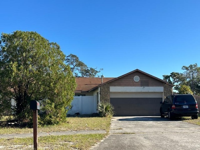 single story home featuring a garage