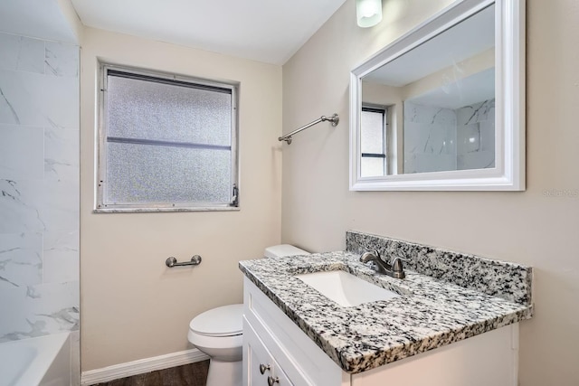 full bathroom featuring hardwood / wood-style flooring, vanity,  shower combination, and toilet