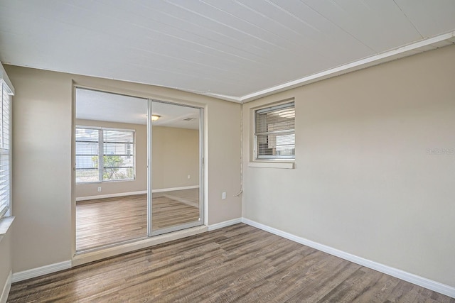 spare room featuring hardwood / wood-style flooring