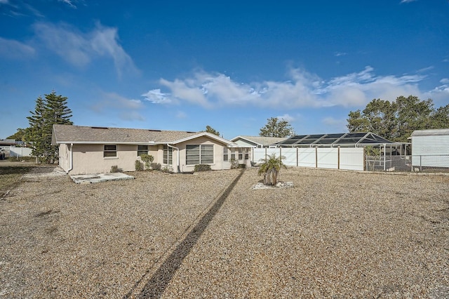 view of front of property featuring a lanai