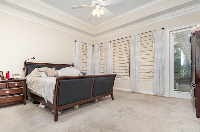 bedroom featuring ceiling fan, ornamental molding, light carpet, and access to outside