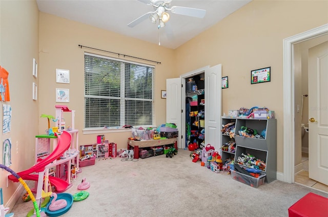 recreation room featuring ceiling fan and carpet floors