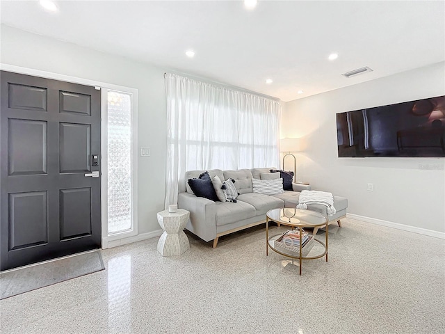 living room with a healthy amount of sunlight