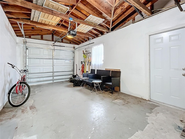 garage featuring a garage door opener