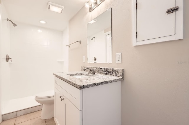 bathroom with walk in shower, toilet, tile patterned floors, and vanity