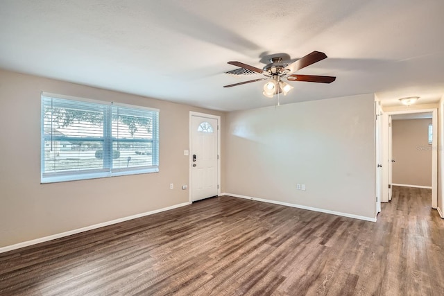 unfurnished room featuring ceiling fan and hardwood / wood-style flooring