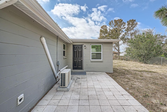 view of patio featuring ac unit