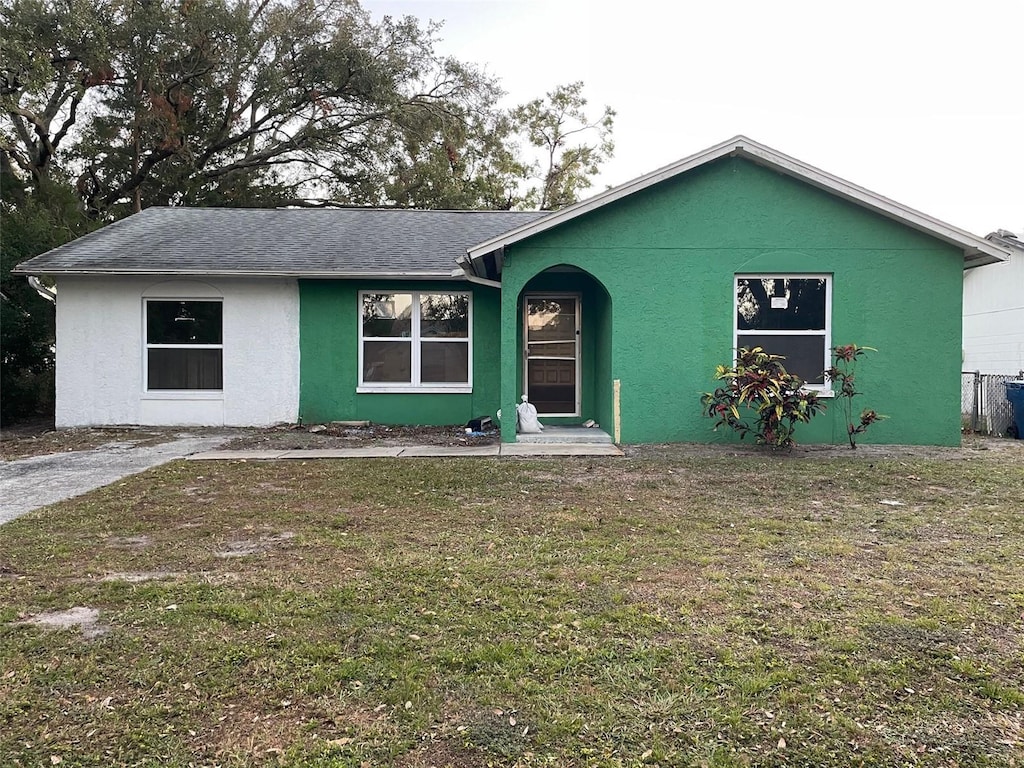 view of front of home with a front yard