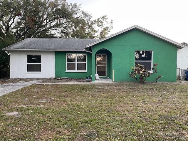 view of front of home with a front yard